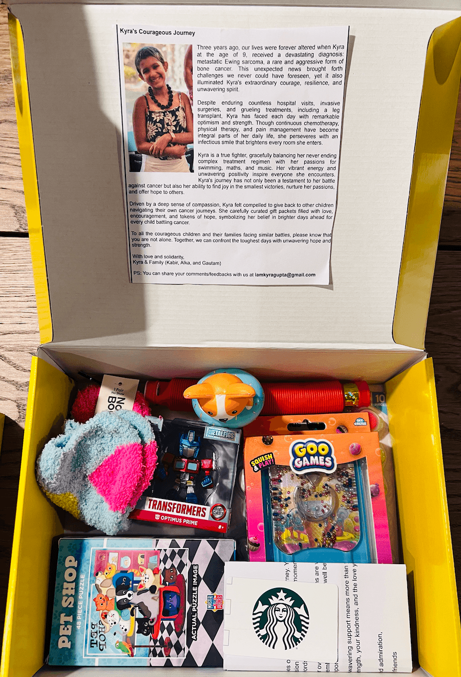 Soft blankets and art supplies arranged for pediatric patients.