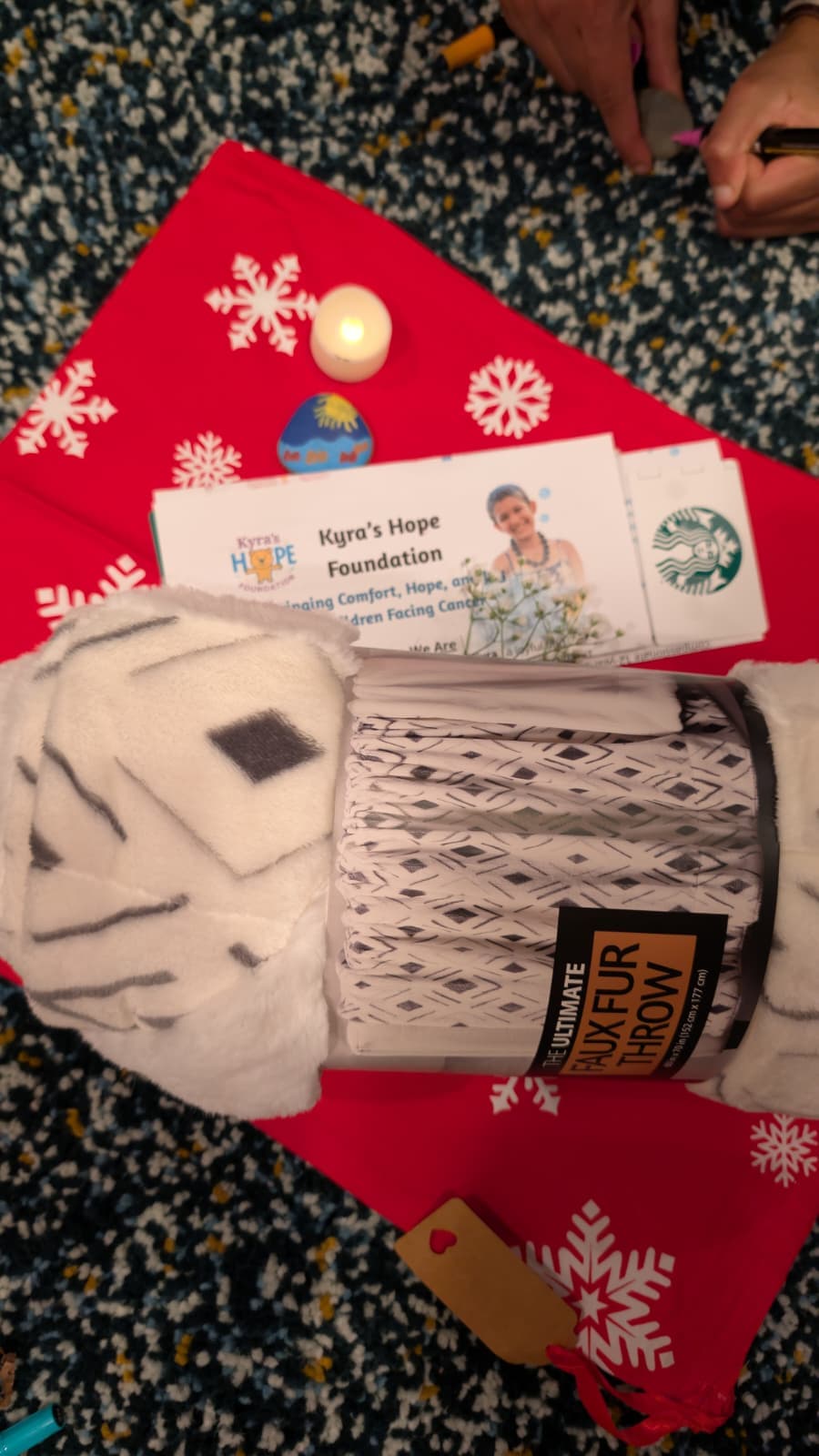 Gift bundles with ribbons ready for delivery to inpatient rooms.