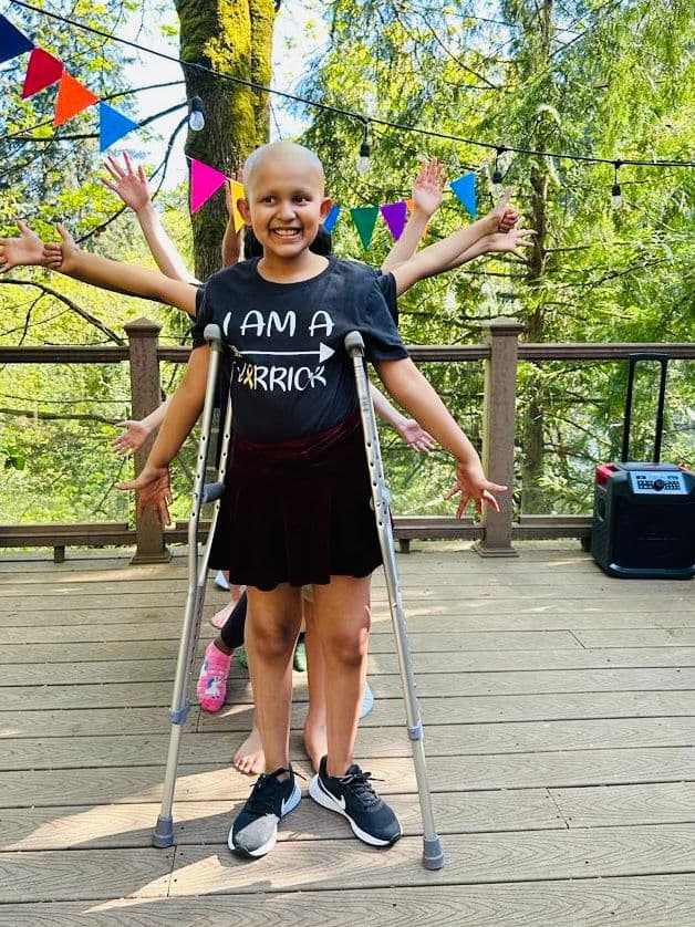 Kyra celebrating with her signature smile