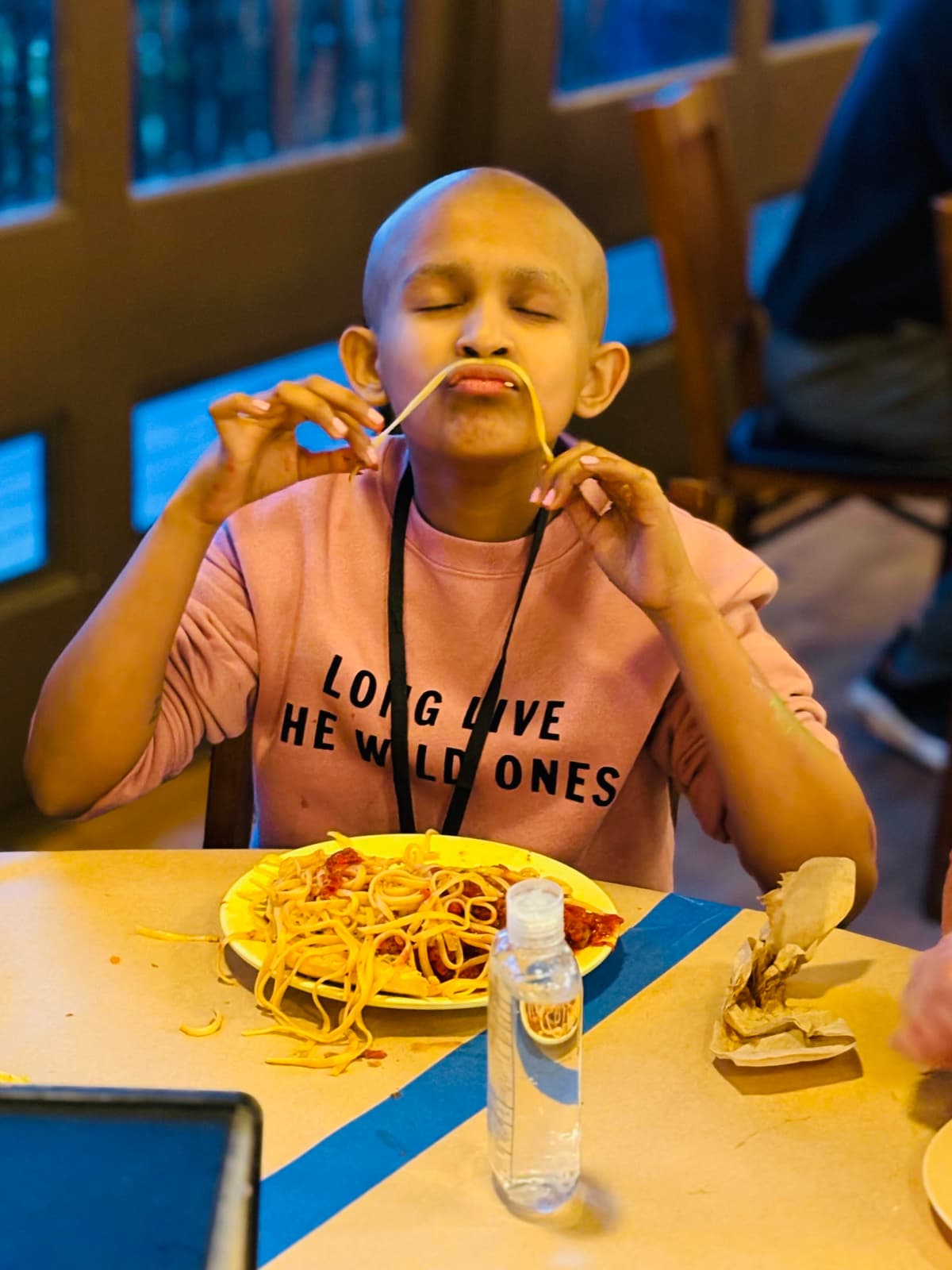 Kyra sharing a joyful moment with friends